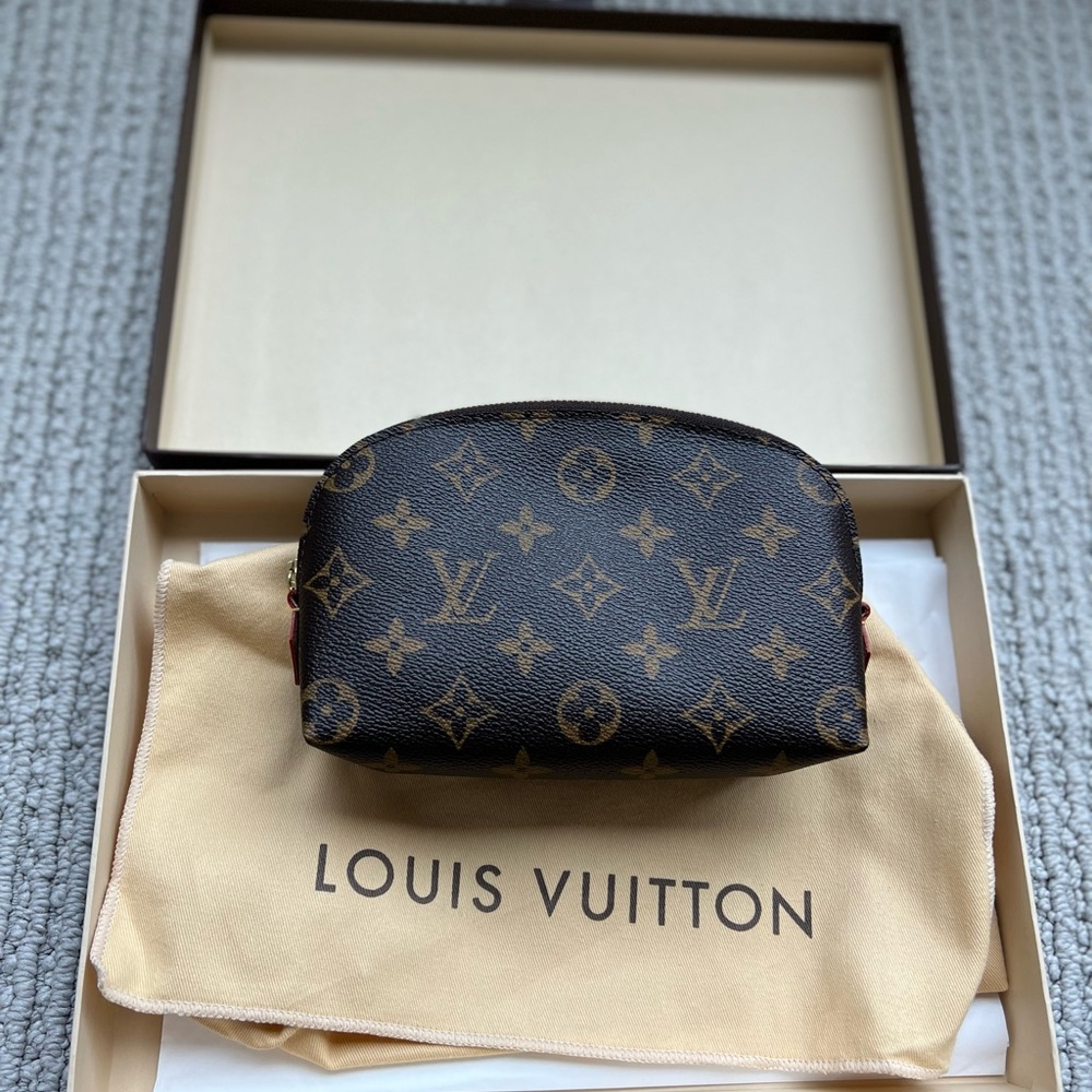 Brand new vintage Pochette cosmetics LV